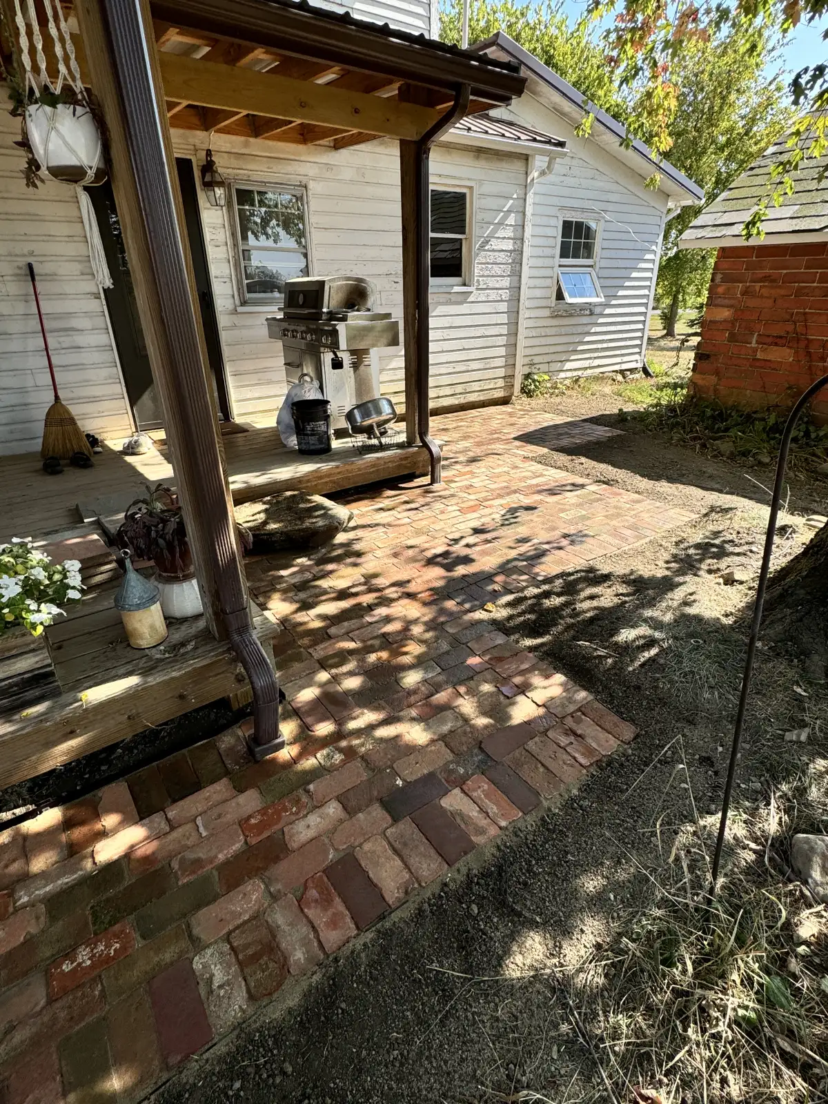 Block retaining wall built along a residential driveway to prevent erosion