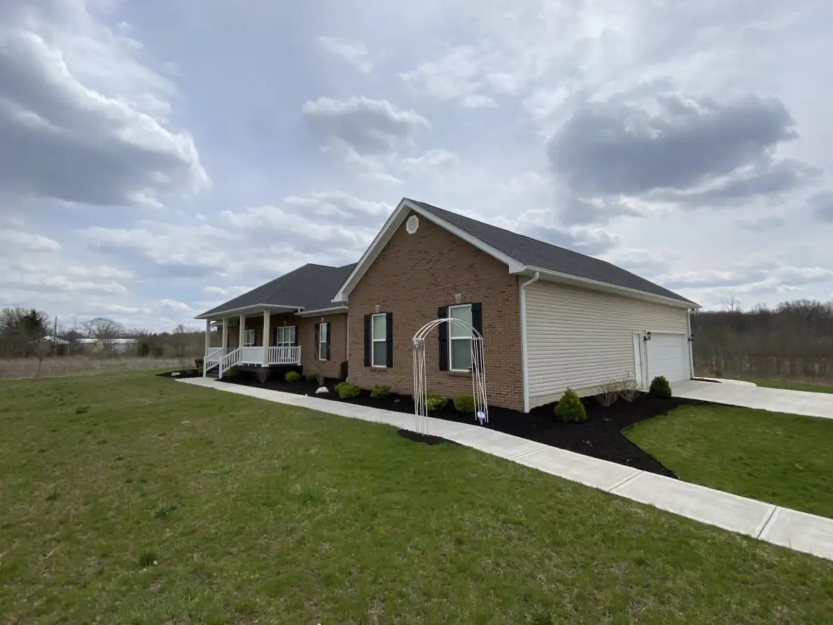 Commercial property landscape maintenance with professionally maintained beds and plantings in Union County, Ohio