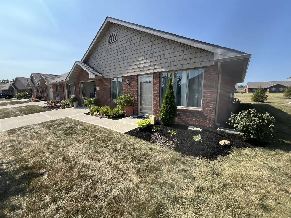 Landscape maintenance and mulch installation at a Marysville property